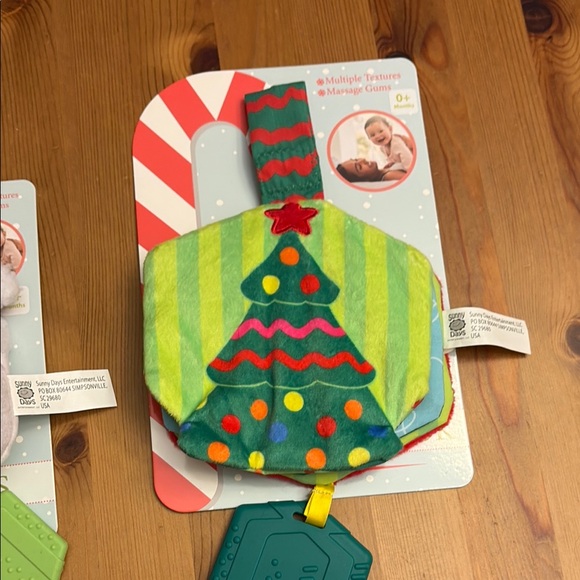 Vibrant Red and Green Holiday baby toys with Santa and Tree Designs - Picture 3 of 8